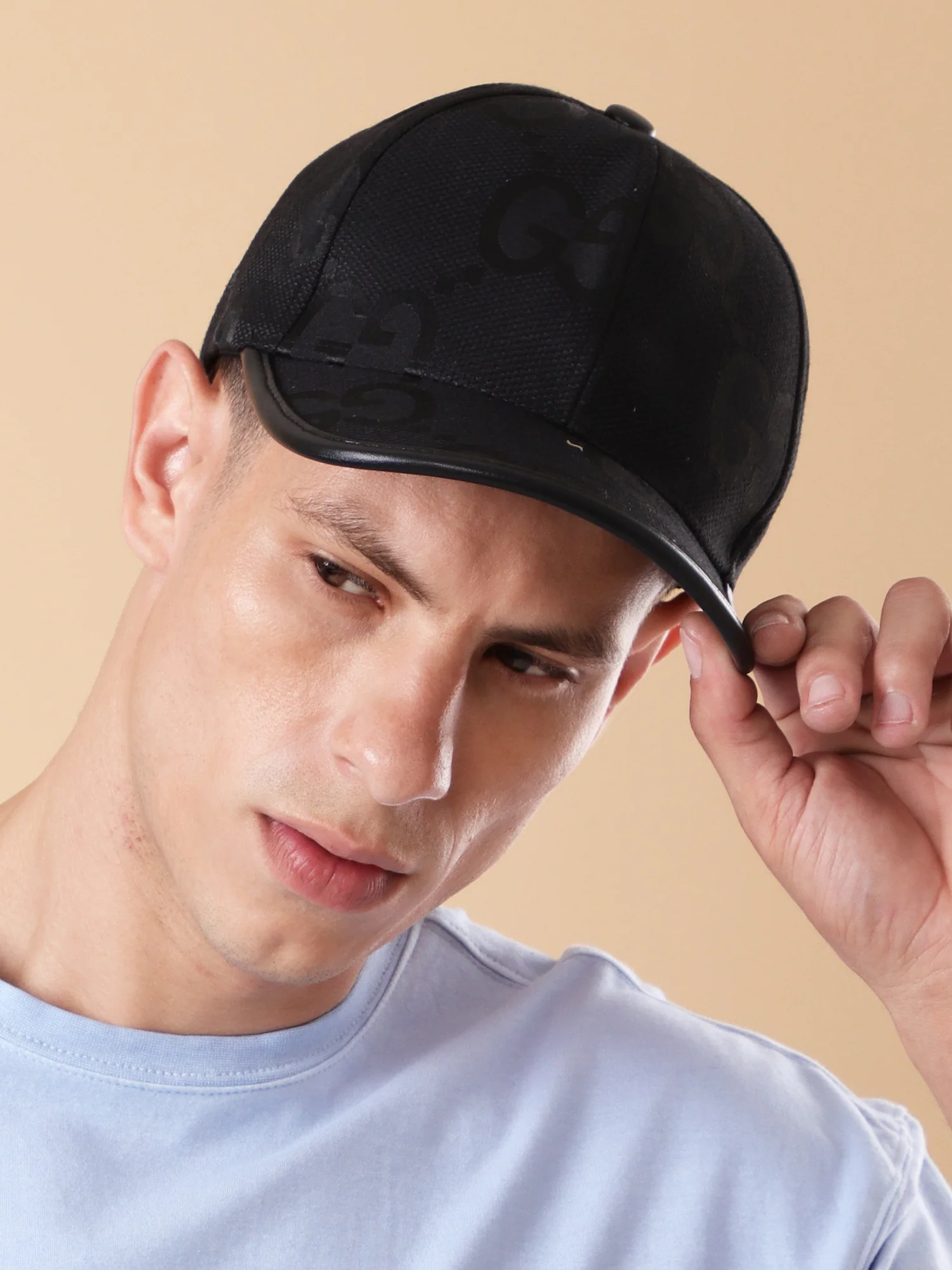 Sleek Black 'GG' Pattern Cap - Textured Design & Faux Leather Brim - Image 3